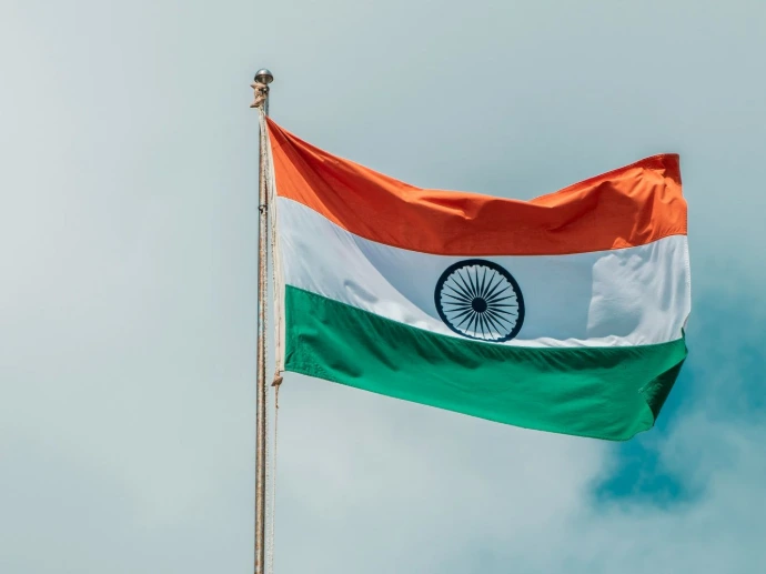 the indian flag is flying high in the sky